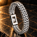 Gevlochten schakelarmband | kliksluiting | 12mm breed